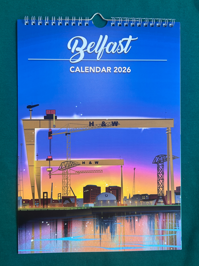 2026 Belfast calendar with a scenic design on a blue background