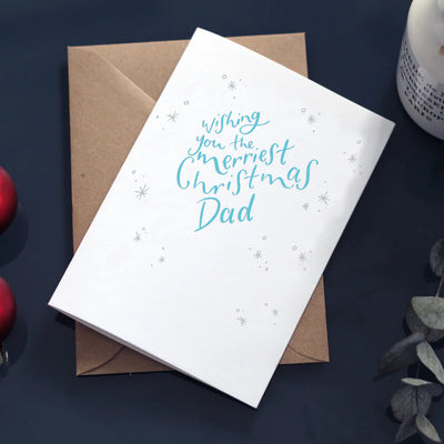 DESEANDOLE LA TARJETA TIPOGRAFÍA DE PAPÁ DE NAVIDAD MÁS FELIZ